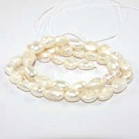 6mm - 7mm White Oval Freshwater Pearls- AA Grade - 38cm Strand