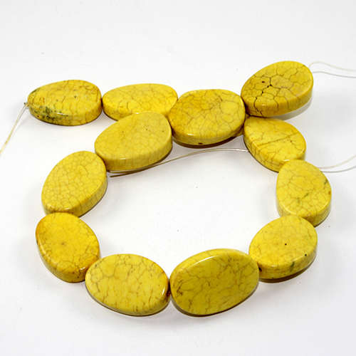 30mm x 21mm Twist Oval Howlite - 35cm Strand - Yellow